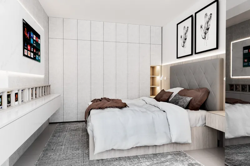 Dormitorio principal: cabecera tapizada, cuadros y paneles blancos texturados.